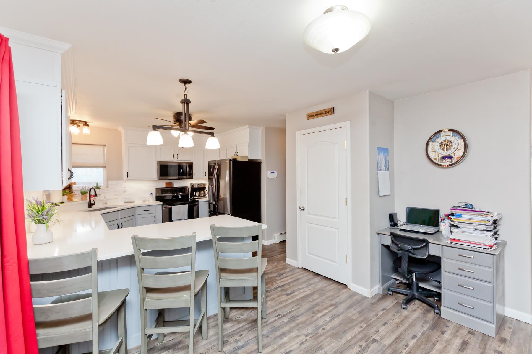 173 Sierra Drive Fruita, CO 81521 - Photo 10 of 40 a view of a dining room with furniture and a chandelier fan