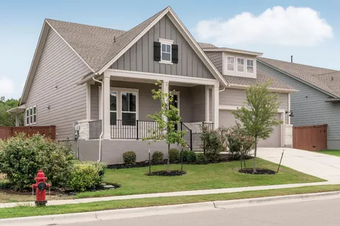 a bathroom with a double vanity sink mirror and