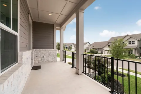 a front view of a house with garage