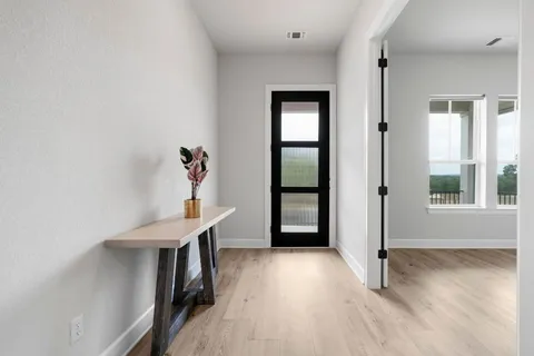 a view of balcony with furniture