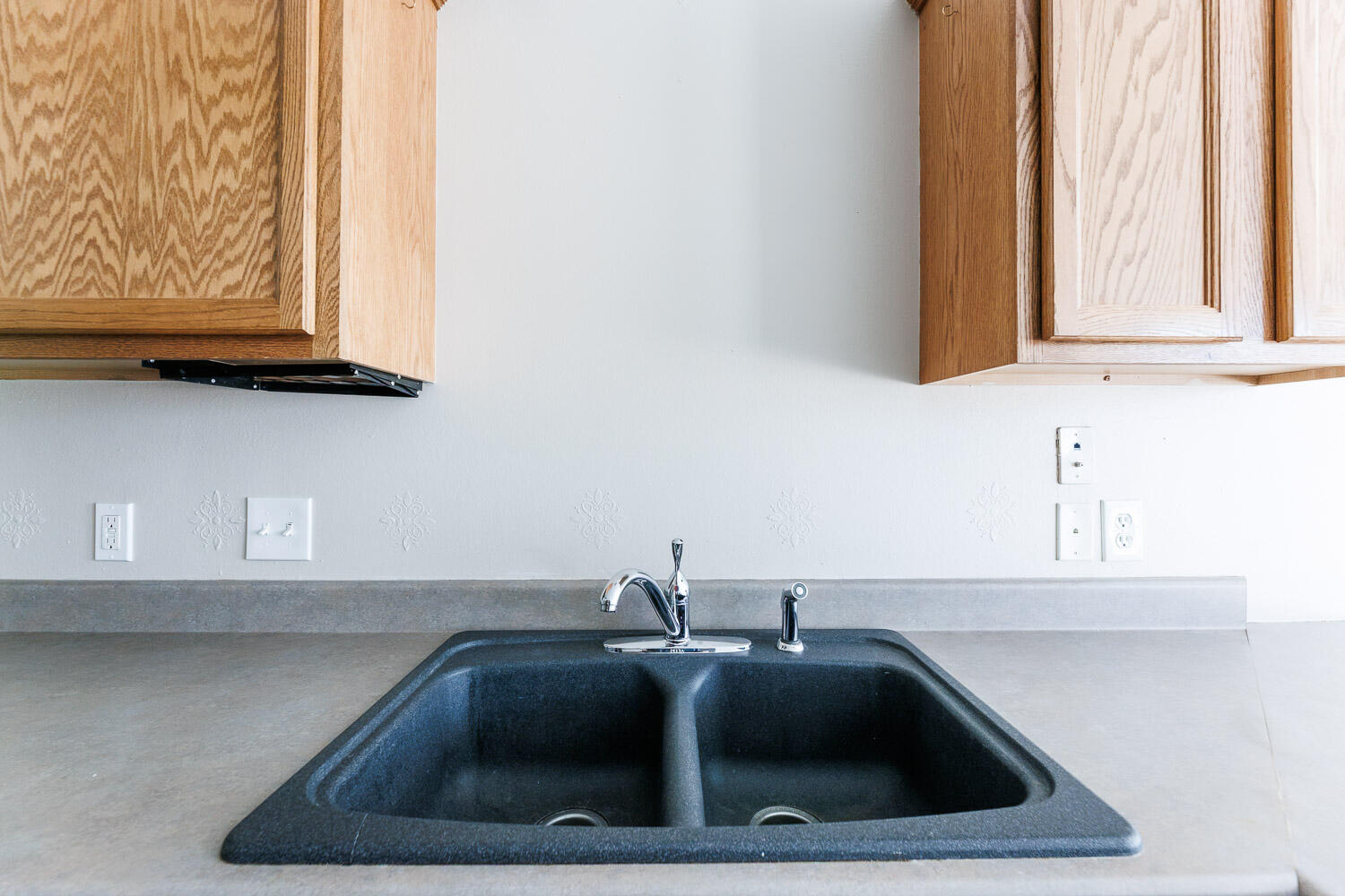 6704 87th Street Lubbock, TX 79424 - Photo 14 of 49 a sink and a mirror