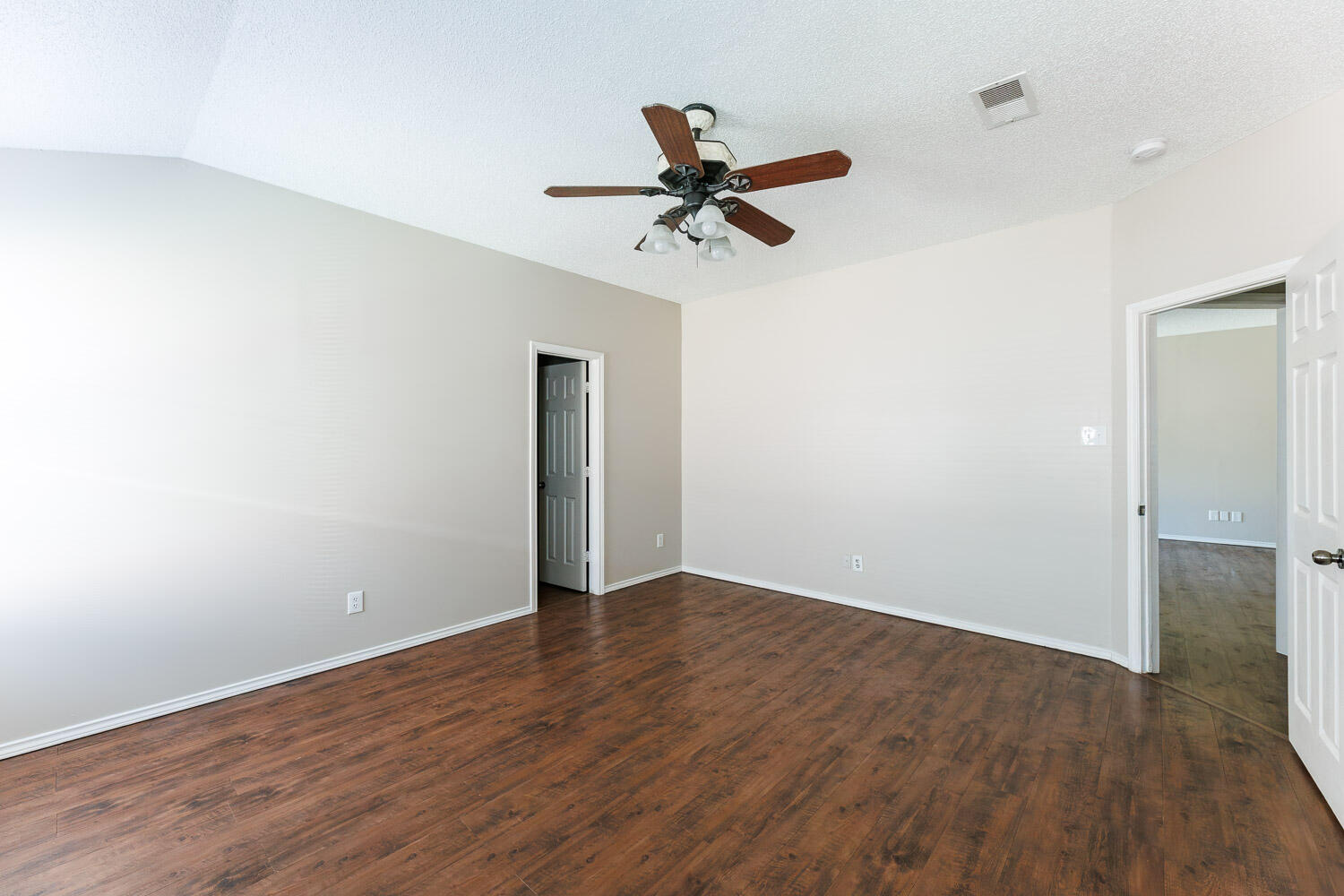 6704 87th Street Lubbock, TX 79424 - Photo 32 of 49 wooden floor in an empty room