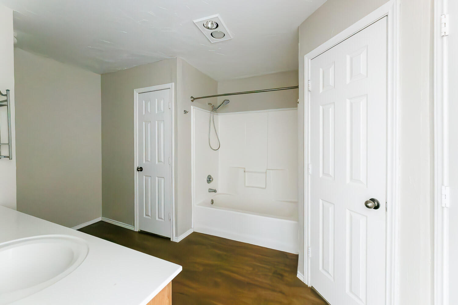 6704 87th Street Lubbock, TX 79424 - Photo 35 of 49 a bathroom with a bathtub and shower