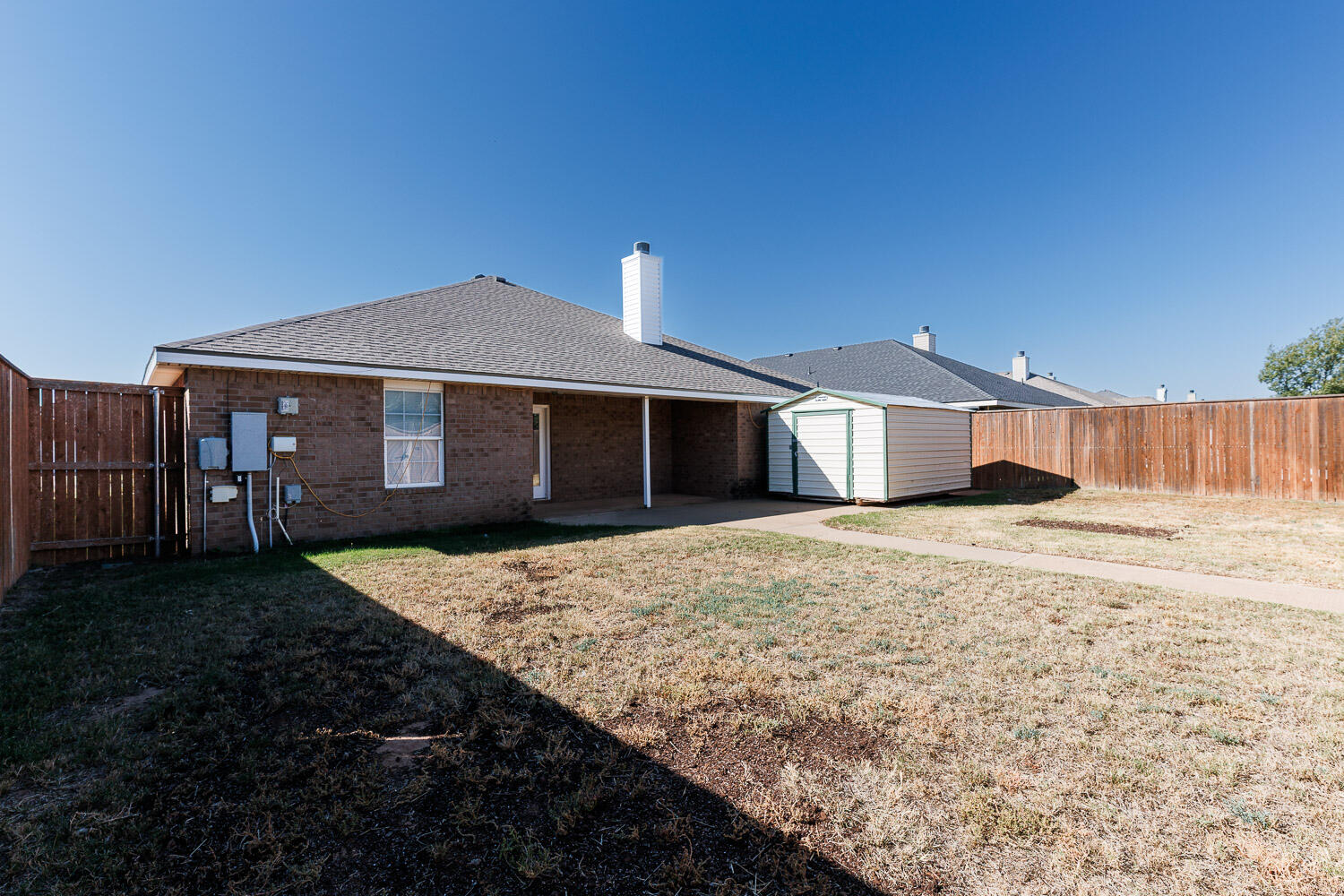 6704 87th Street Lubbock, TX 79424 - Photo 48 of 49 a front view of a house with a yard