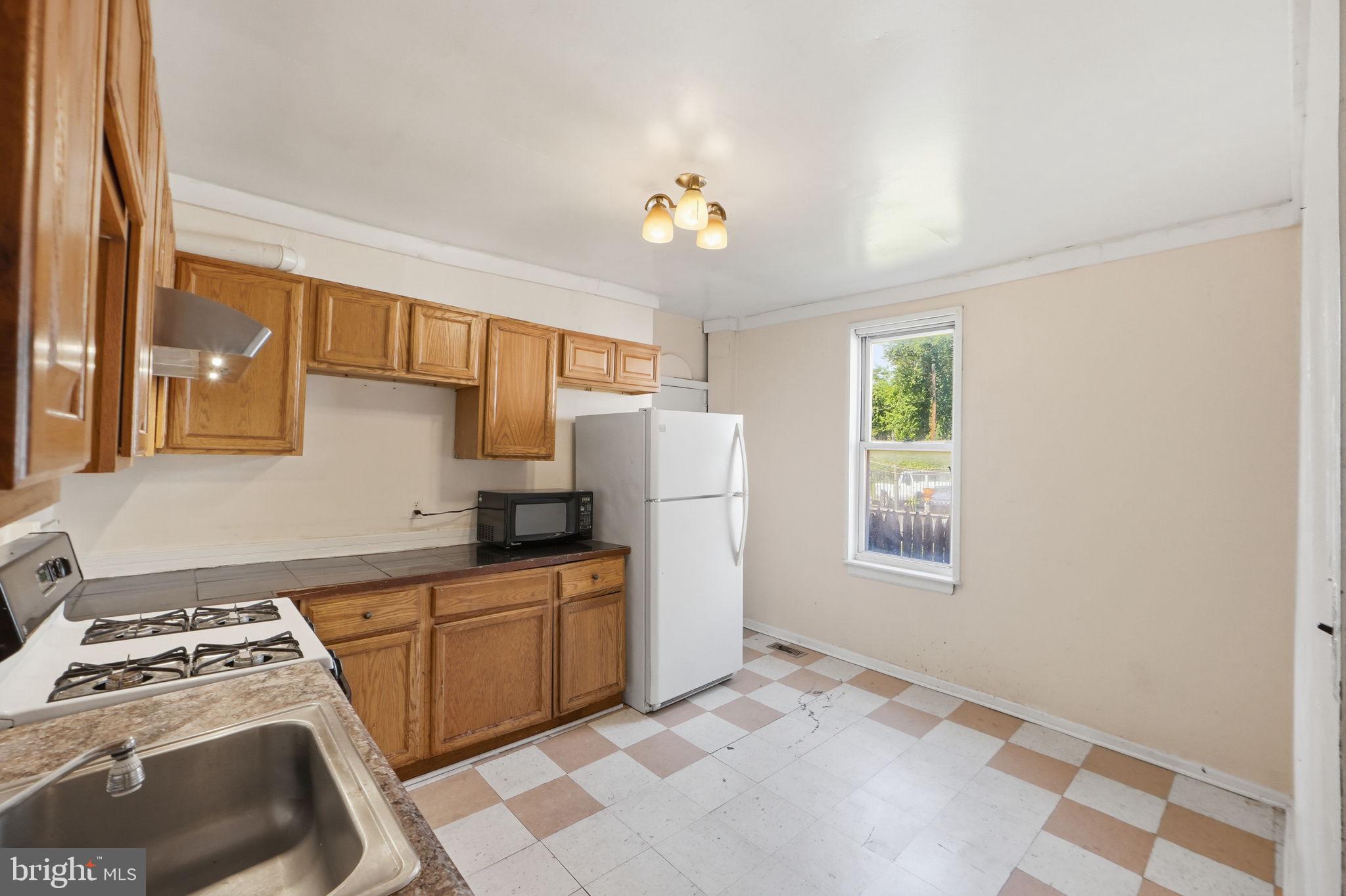 3449 Old Frederick Road Baltimore, MD 21229 - Photo 5 of 25 Bright and inviting kitchen space.