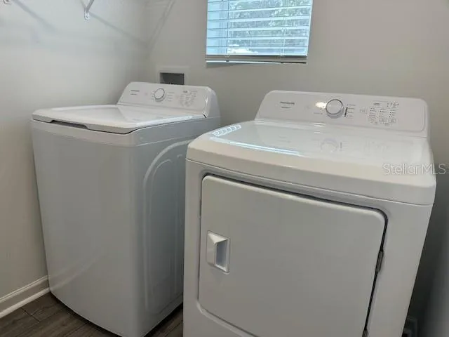 a utility room with dryer and washer