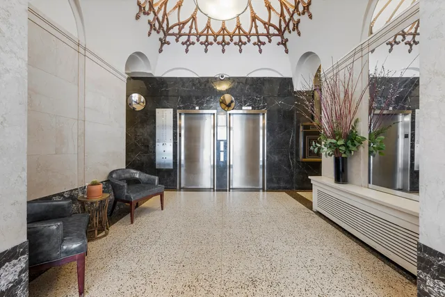 a view of kitchen and utility room with wooden floor