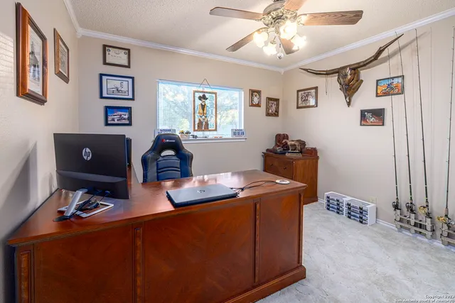 a workspace with furniture and window