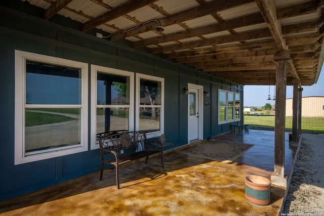 a view of a porch with chairs
