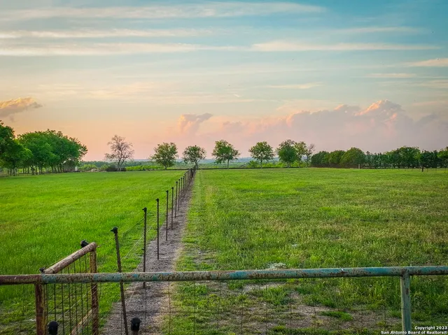 a view of a lake with a big yard