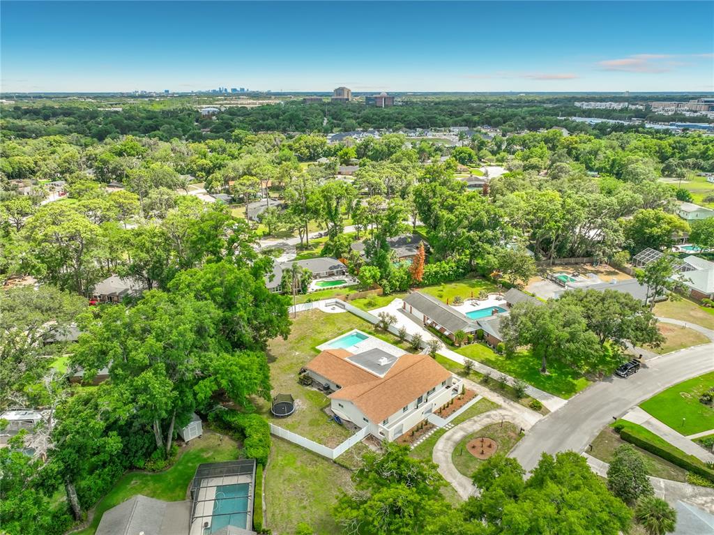 153 Variety Tree Circle Altamonte Springs, FL 32714 - Photo 43 of 44 an aerial view of residential houses with outdoor space and trees