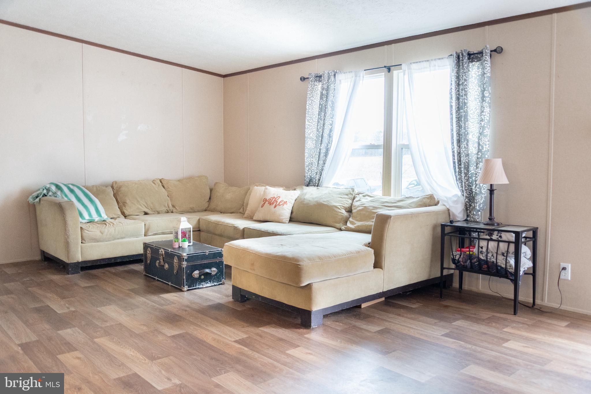 278 Rising Sun Road Mineral, VA 23117 - Photo 2 of 14 Large family room with plenty of space for seating