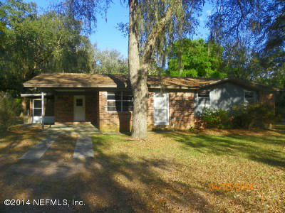 96770 Chester Road Yulee, FL 32097 - Photo 12 of 12 a view of a house with a yard and tree