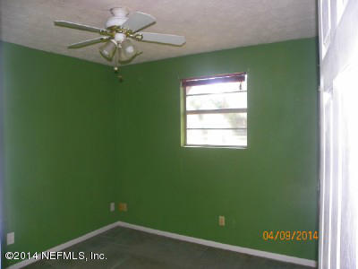 96770 Chester Road Yulee, FL 32097 - Photo 3 of 12 a view of a window in an empty room