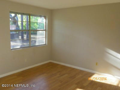 96770 Chester Road Yulee, FL 32097 - Photo 7 of 12 a view of a room that has a window in it