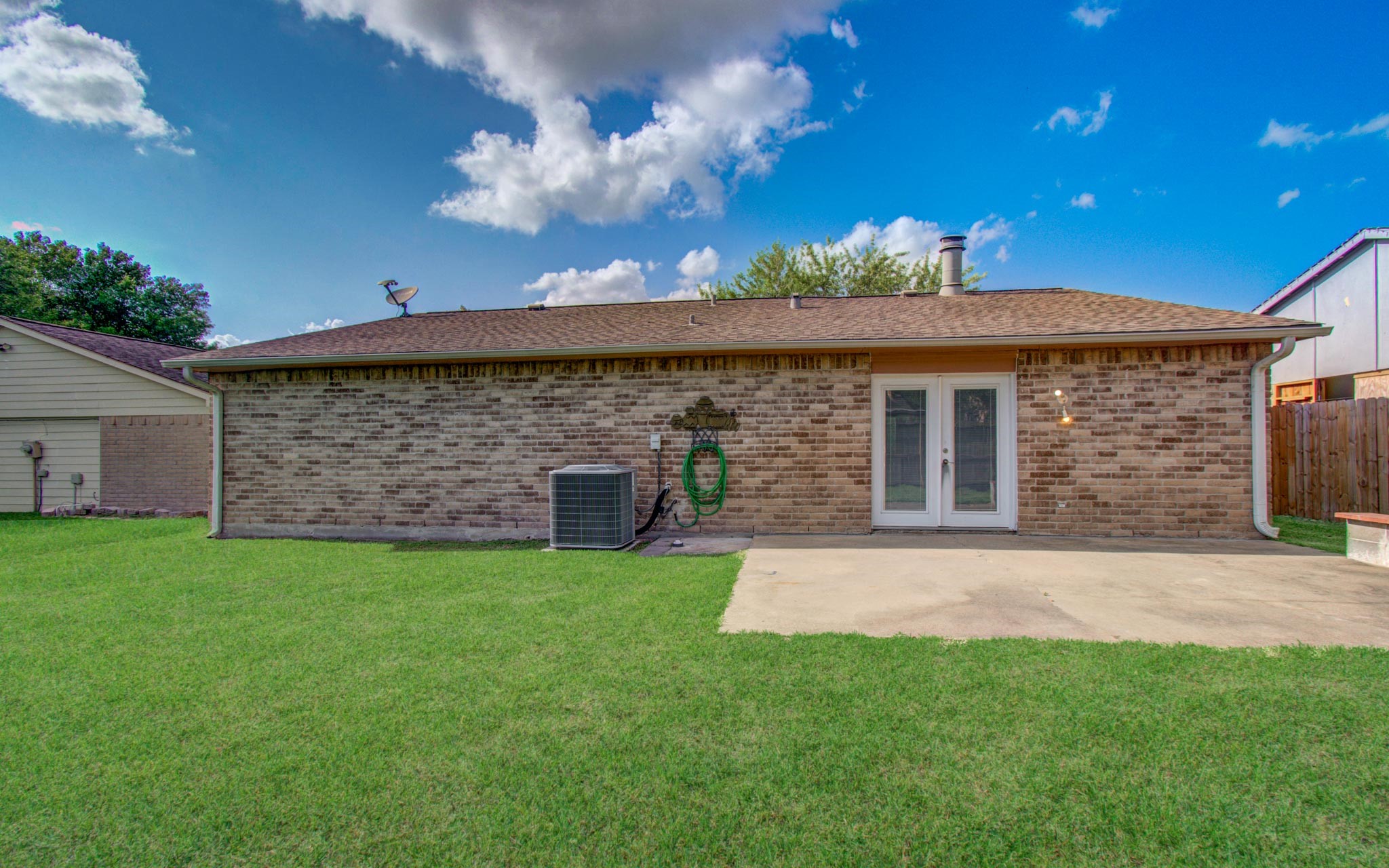 5706 Spring Grove Lane Spring, TX 77373 - Photo 10 of 12 a view of a house with a yard