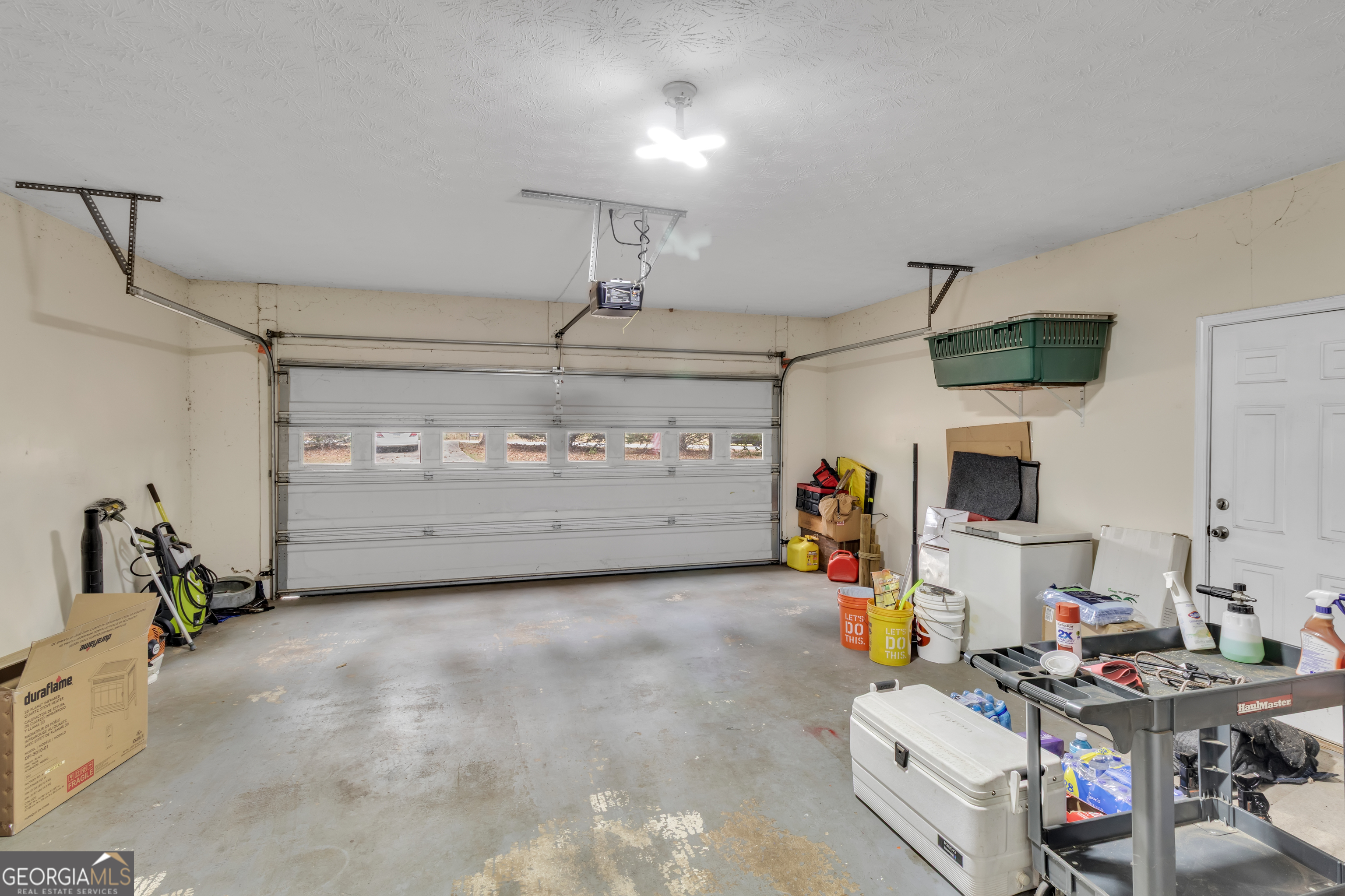 66 Ellis Trail Covington, GA 30016 - Photo 23 of 39 a view of storage and utility room