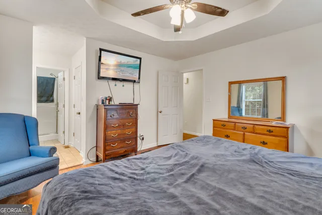 a bathroom with a sink a mirror and a bathtub