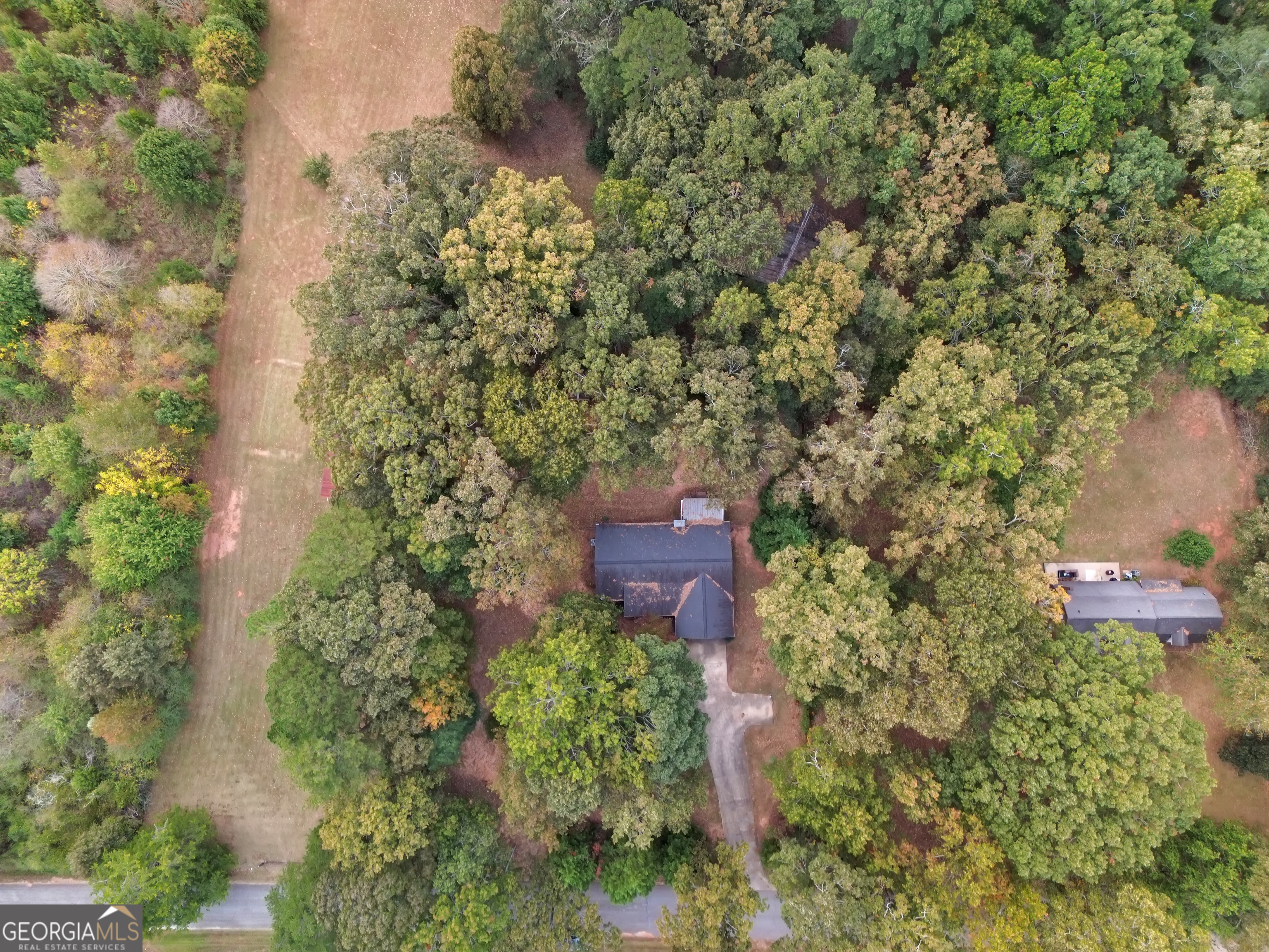 66 Ellis Trail Covington, GA 30016 - Photo 9 of 39 an aerial view of a house with a yard