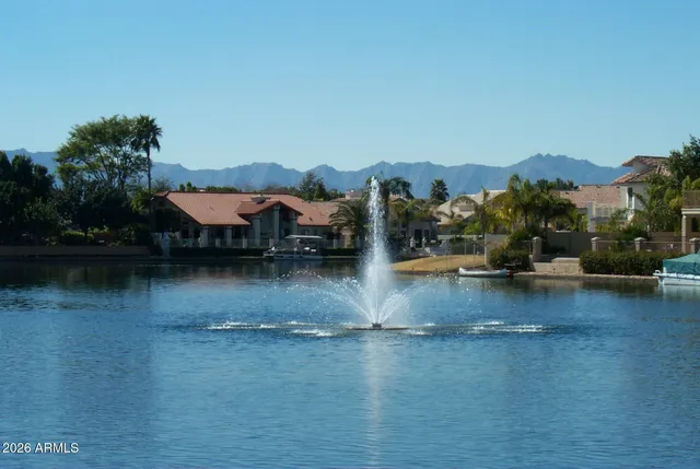 a view of a lake in front of house