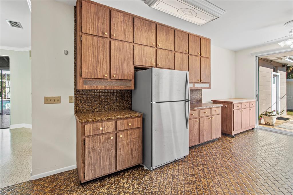 2605 Desoto Road Sarasota, FL 34243 - Photo 14 of 27 a kitchen with stainless steel appliances a refrigerator and a stove