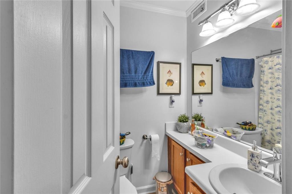 301 Cobblestone Trail Avondale Estates, GA 30002 - Photo 18 of 25 a bathroom with a sink vanity granite and toilet