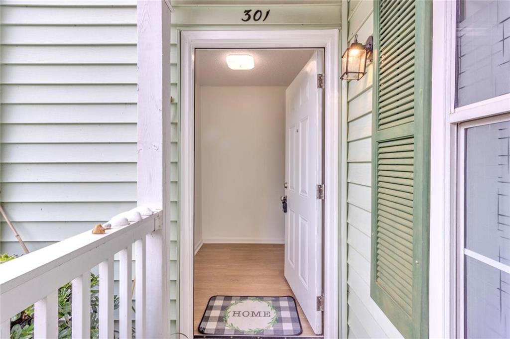 301 Cobblestone Trail Avondale Estates, GA 30002 - Photo 3 of 25 a view of a hallway with a door
