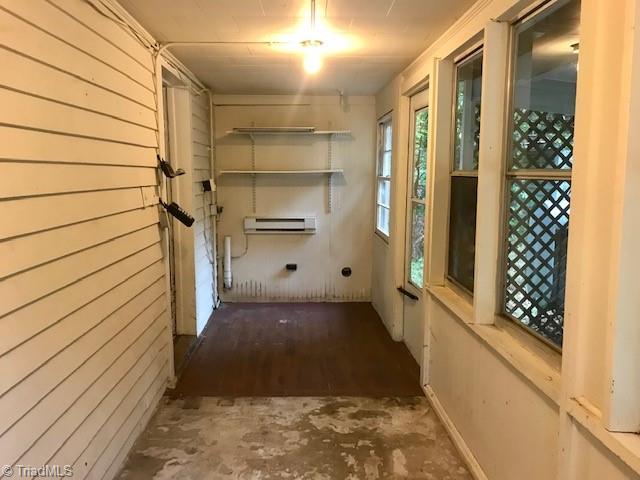 7702 Summerfield Road Summerfield, NC 27358 - Photo 15 of 21 Side porch to deck - not counted in square footage