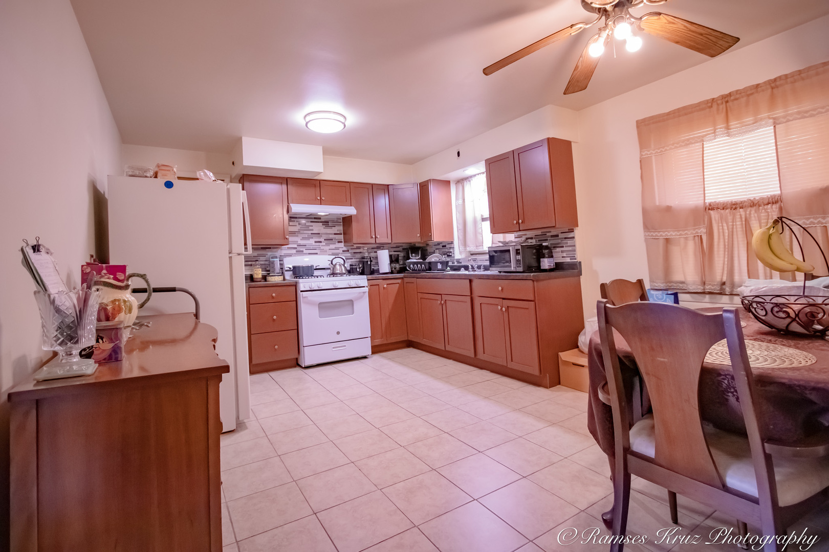 7844 South Jeffery Boulevard Chicago, IL 60649 - Photo 15 of 20 a kitchen with stainless steel appliances granite countertop sink stove and refrigerator