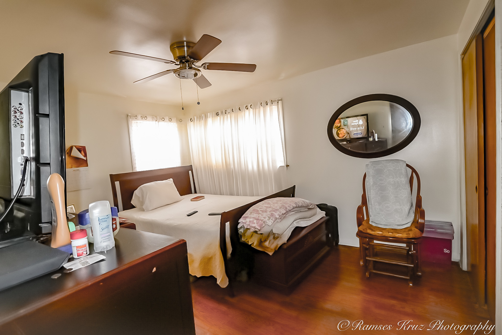 7844 South Jeffery Boulevard Chicago, IL 60649 - Photo 17 of 20 a bedroom with bed and a chandelier