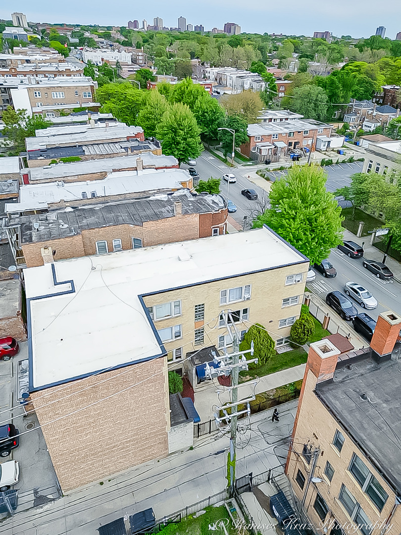 7844 South Jeffery Boulevard Chicago, IL 60649 - Photo 5 of 20 an aerial view of a house with a swimming pool