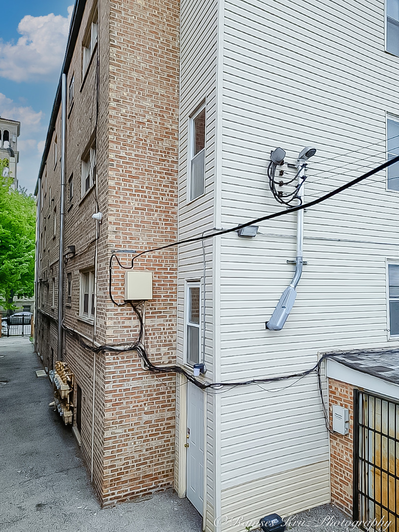 7844 South Jeffery Boulevard Chicago, IL 60649 - Photo 10 of 20 a view of street from balcony