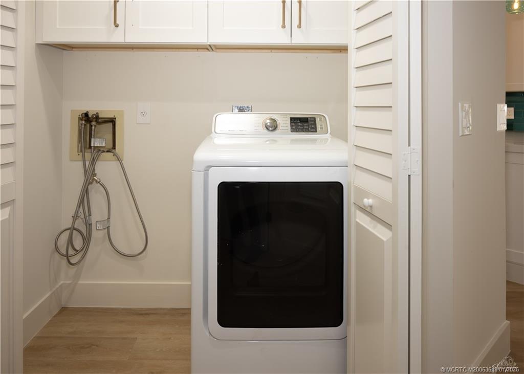 2425 Southwest Foxpoint Trail Palm City, FL 34990 - Photo 32 of 33 a utility room with dryer and washer