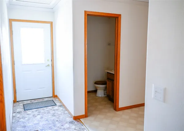 a kitchen with stainless steel appliances granite countertop a sink a stove and cabinets