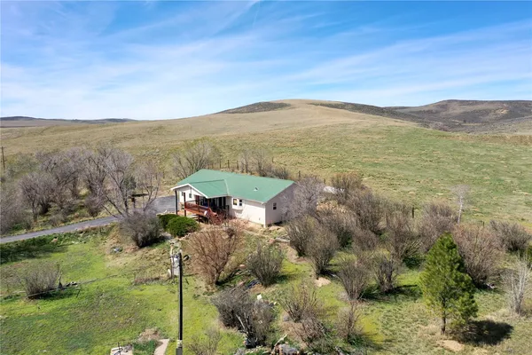 a view of a terrace with a garden