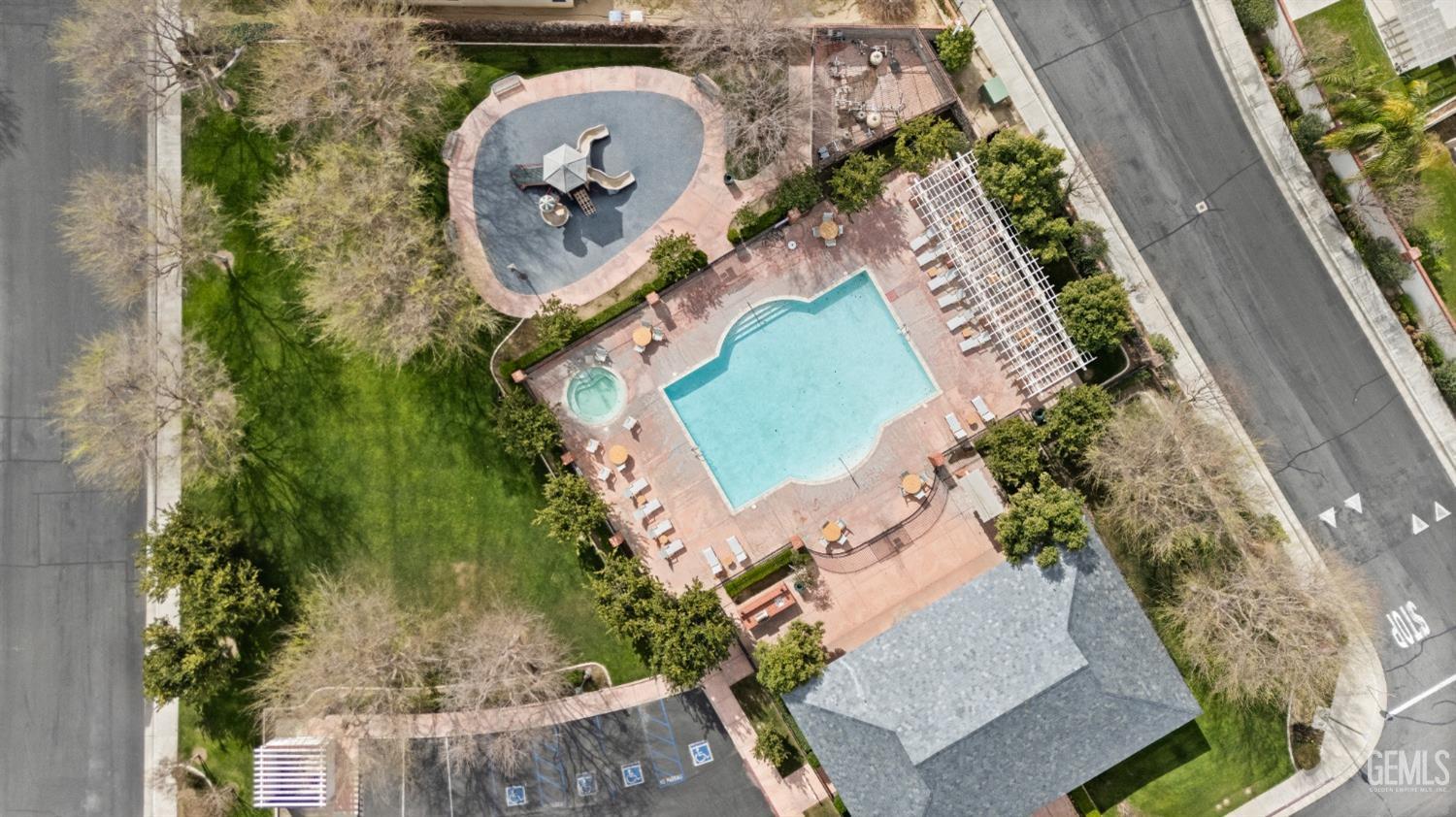 Undisclosed Address Bakersfield, CA 93311 - Photo 3 of 30 an aerial view of a house with garden space and swimming pool