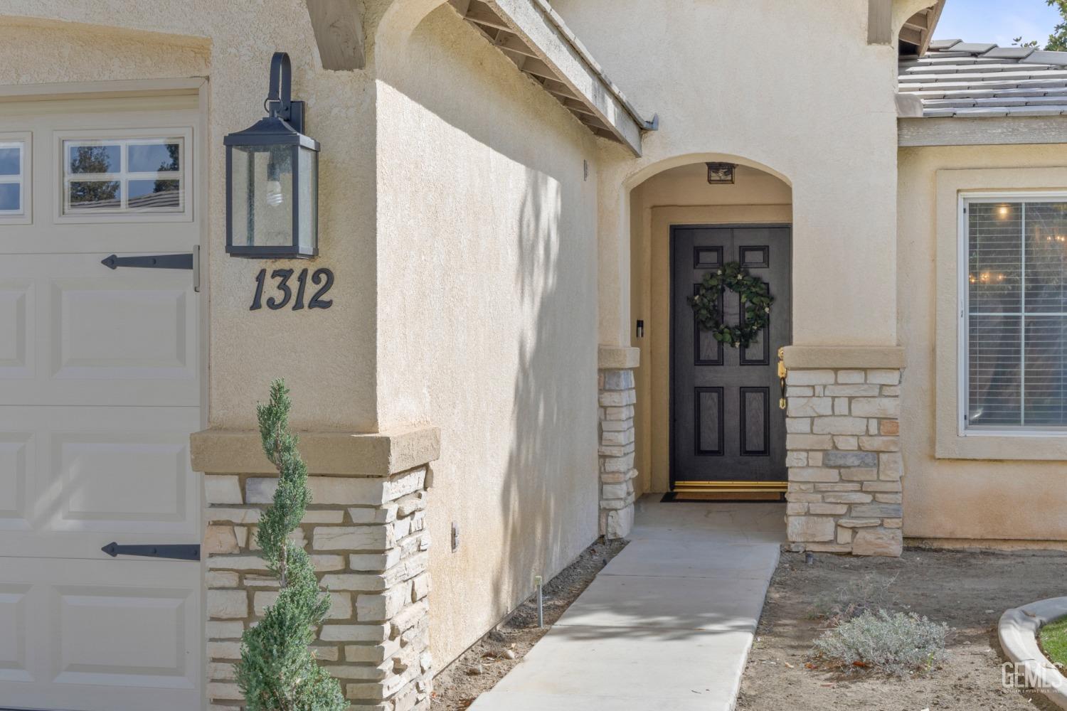 Undisclosed Address Bakersfield, CA 93311 - Photo 8 of 30 a view of front door of house
