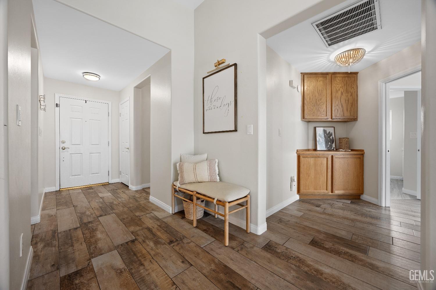 Undisclosed Address Bakersfield, CA 93311 - Photo 10 of 30 a living room with a bed and furniture