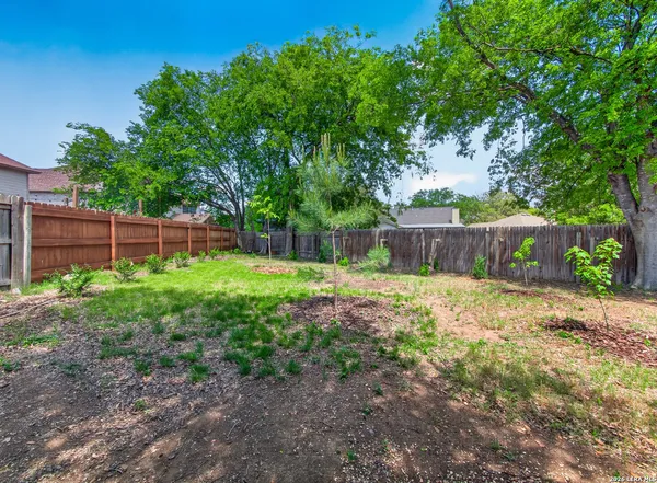 a view of a backyard with a garden