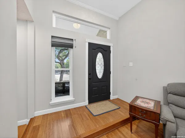 a bedroom with a bed and a mirror