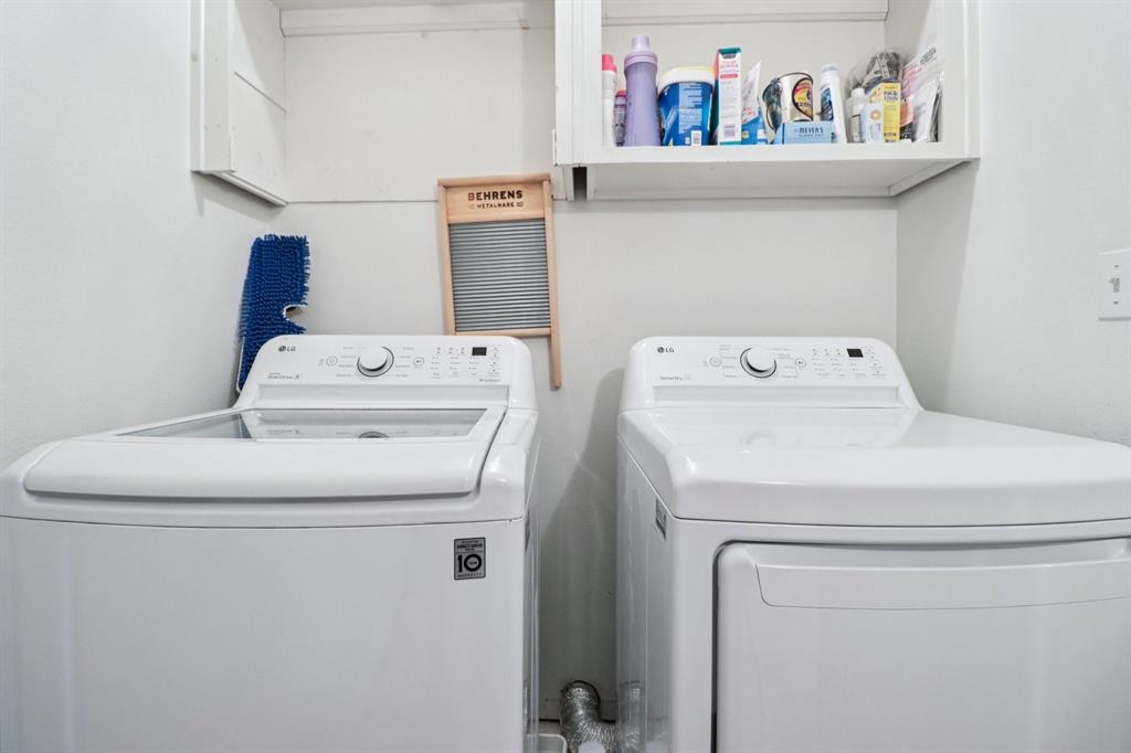 1590 Airport Road Aledo, TX 76008 - Photo 13 of 26 a utility room with dryer and washer