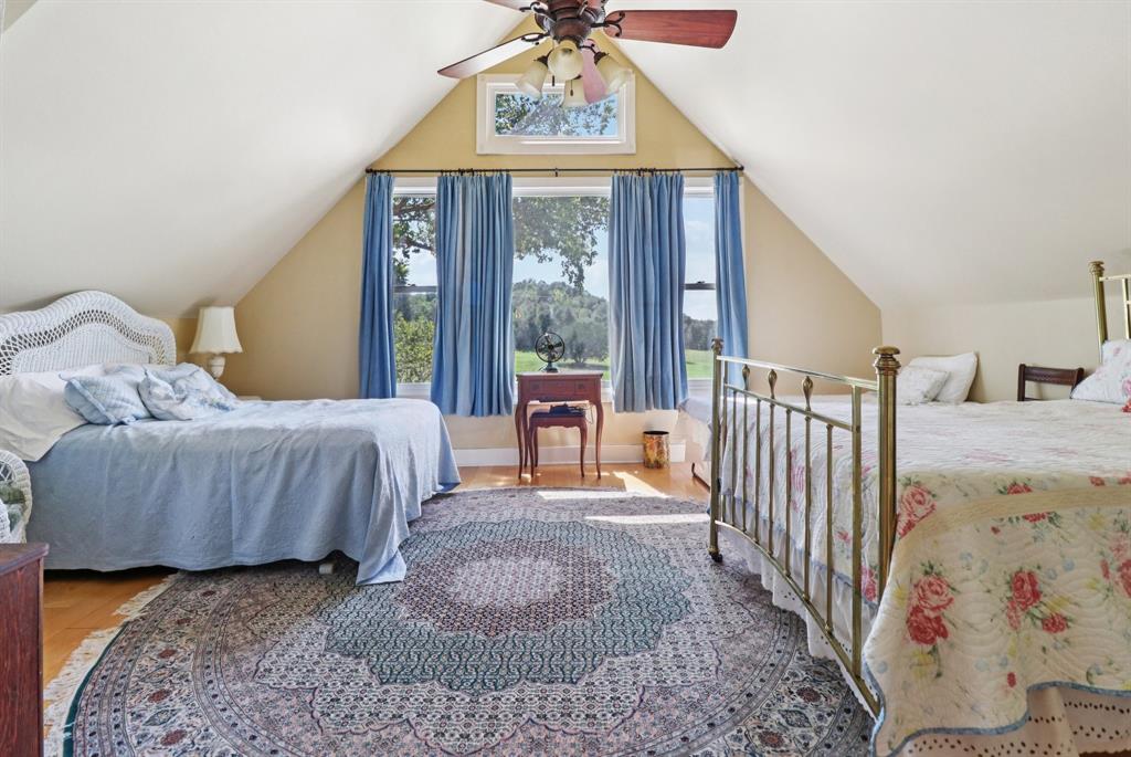 1590 Airport Road Aledo, TX 76008 - Photo 17 of 26 a bedroom with a bed and a window