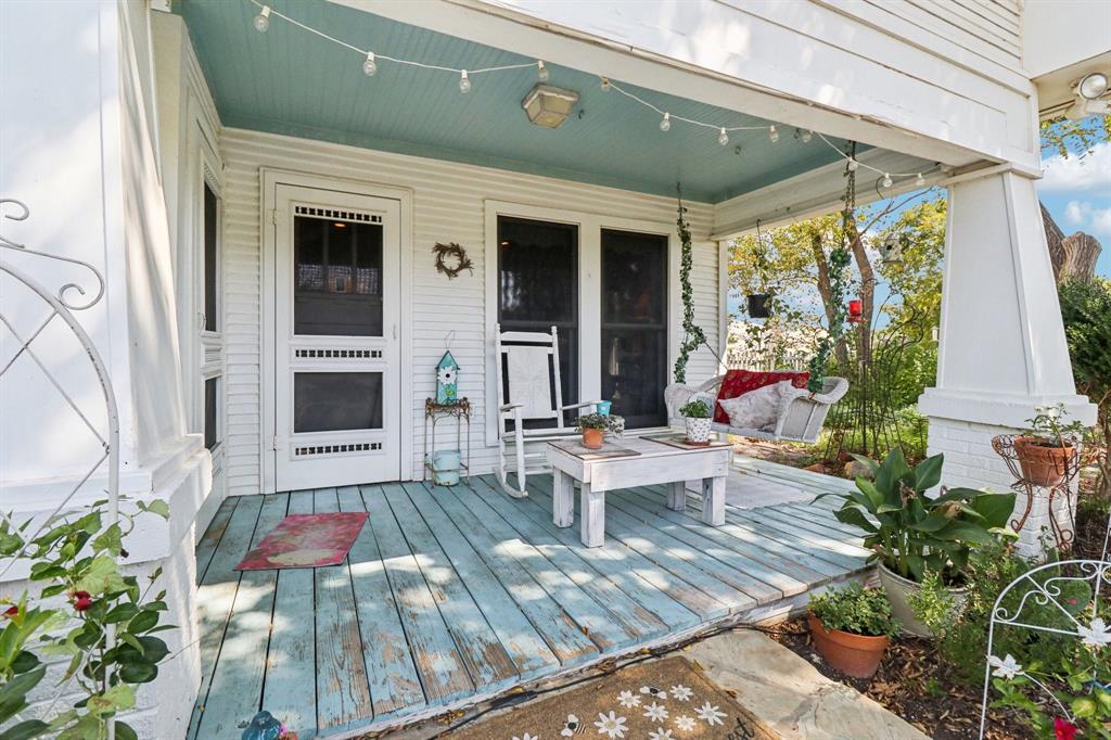 1590 Airport Road Aledo, TX 76008 - Photo 2 of 26 a view of a patio with table and chairs potted plants