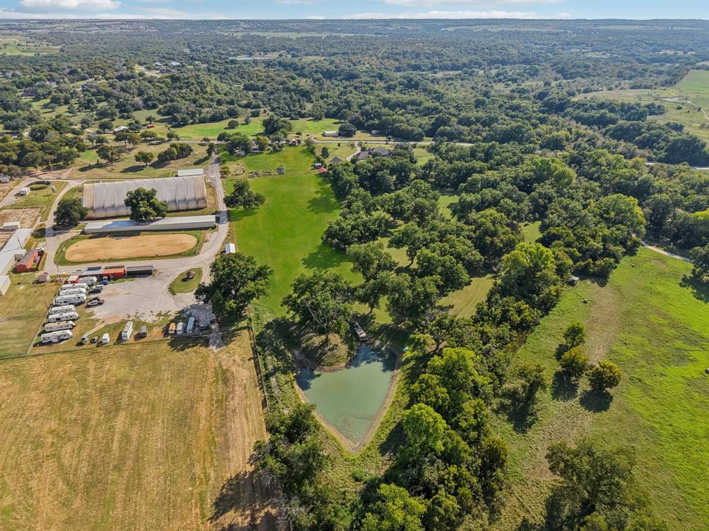1590 Airport Road Aledo, TX 76008 - Photo 25 of 26 an aerial view of residential houses with outdoor space