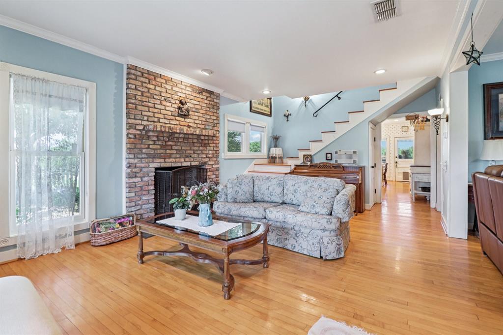1590 Airport Road Aledo, TX 76008 - Photo 6 of 26 a living room with furniture and a fireplace