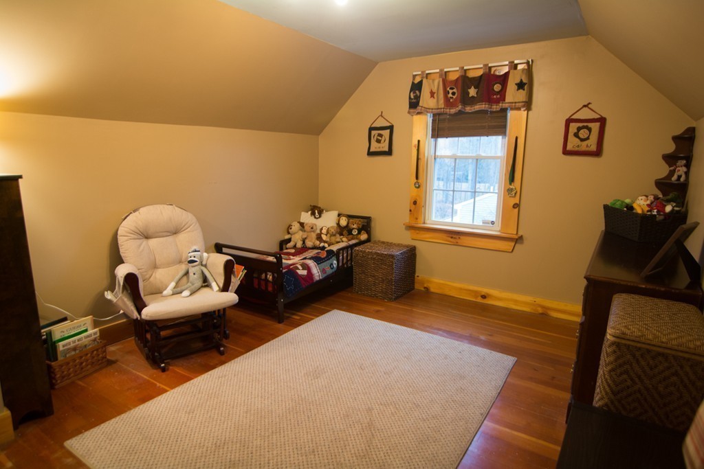 5 Farquhar Road Sturbridge, MA 01566 - Photo 14 of 27 a bedroom with furniture and a window
