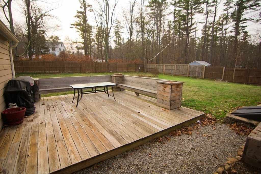 5 Farquhar Road Sturbridge, MA 01566 - Photo 21 of 27 a view of a backyard with sitting area