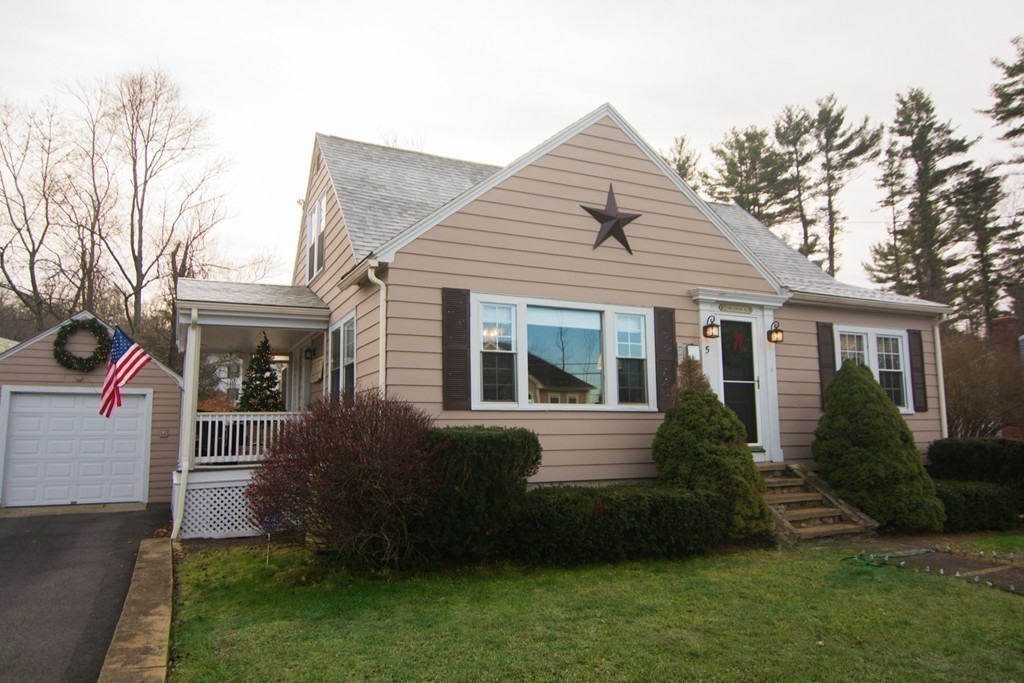 5 Farquhar Road Sturbridge, MA 01566 - Photo 26 of 27 a front view of a house with a garden and plants