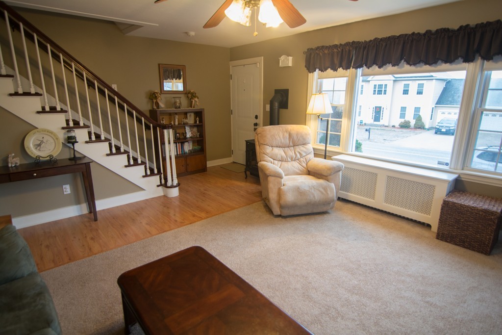 5 Farquhar Road Sturbridge, MA 01566 - Photo 5 of 27 a living room with furniture and a large window