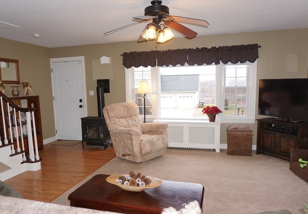5 Farquhar Road Sturbridge, MA 01566 - Photo 6 of 27 a living room with furniture and a flat screen tv